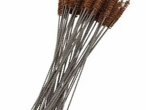 Bundle of natural brown fibre brushes with twisted wire handles